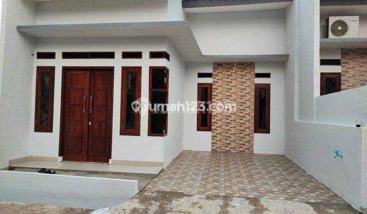 Rumah Minimalis garasi Mobil 200 jt an 3 unit Lagi 1