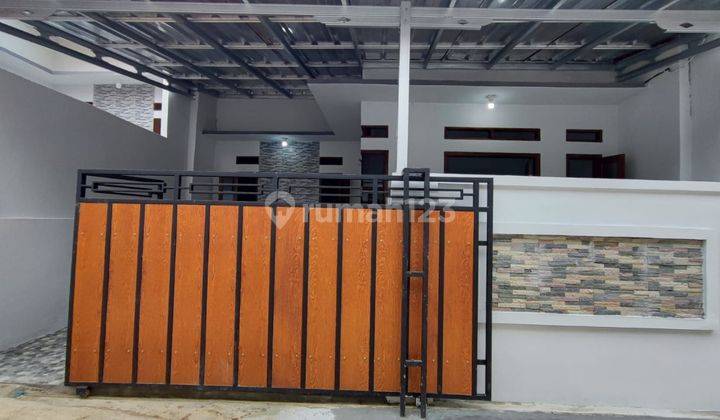 Rumah pinggir jalan garasi mobil 3 unit Lagi 2