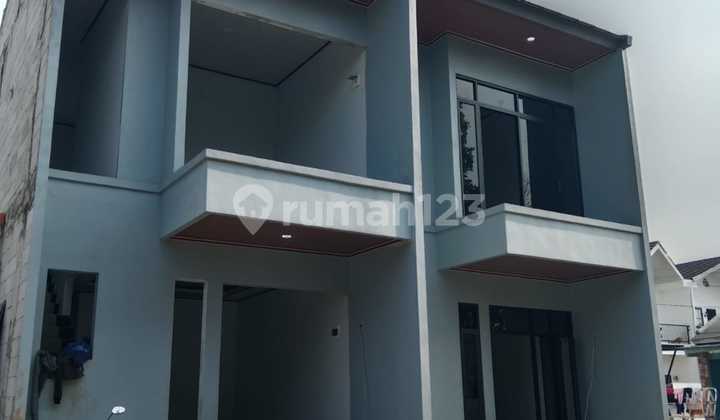 Available 2-story ready-to-occupy house, a step away from Cimanggis toll road. 2