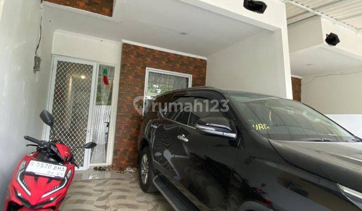 Rumah 4x20 Siap Huni Strategis di Taman Ratu(TR202) 1