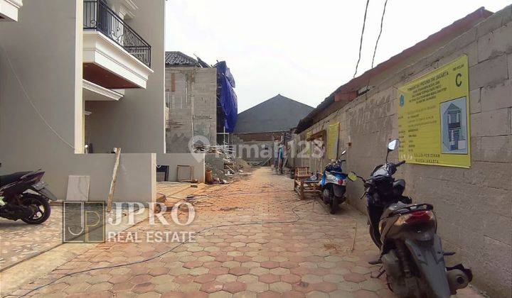 RUMAH BARU DALAM CLUSTER PINGGIR JALAN  2