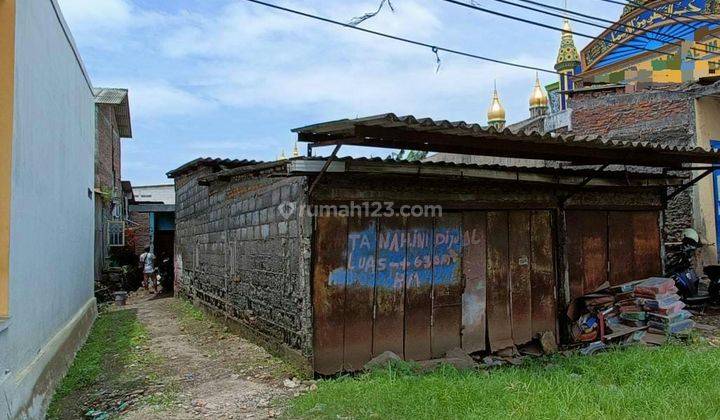 Tanah pinggir jalan raya 1