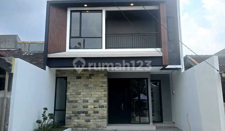 Rumah Modern Tropical Dalam Cluster di Graha Raya Bintaro