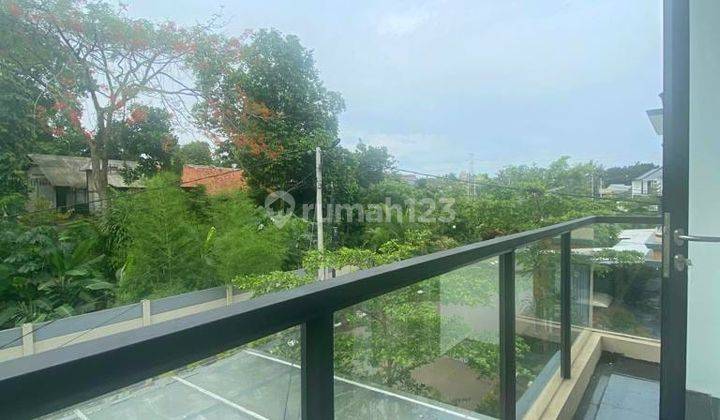 Rumah Hoek Row Jalan Depan Lebar Semi Furnished Di Sawangan 2