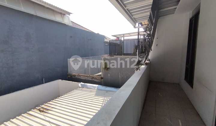 Rumah Minimalis 2 LT di Taman Kopo Indah 5 Sherwood 2