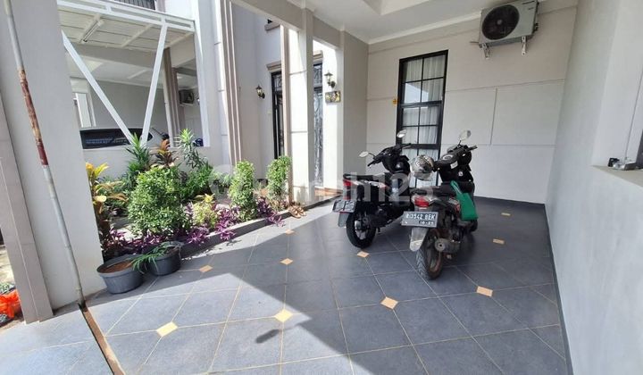 For Sale 2-Story Semi-Furnished House in a Comfortable Semi-Cluster Environment at Tanah Baru Beji Depok. 2