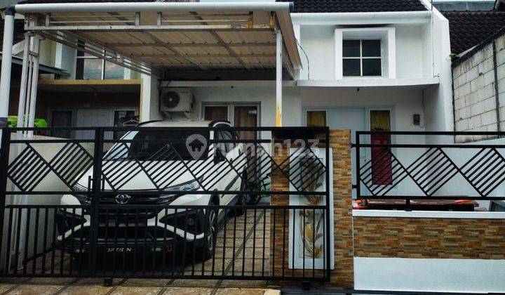 rumah Cluster one gate bukit kencana jaya 1