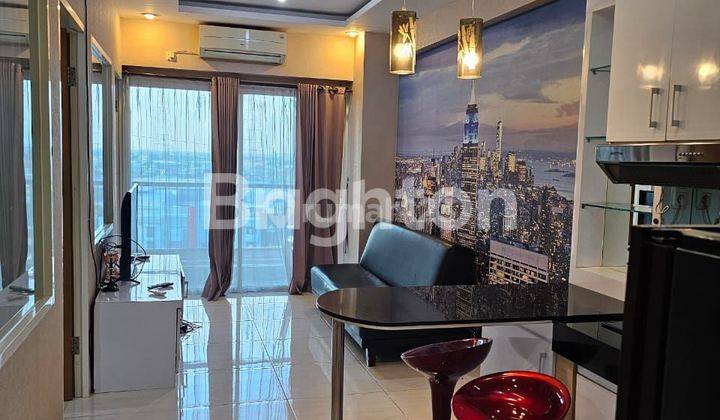 APARTEMEN PUNCAK BUKIT GOLF TIPE 2BR VIEW POOL 1