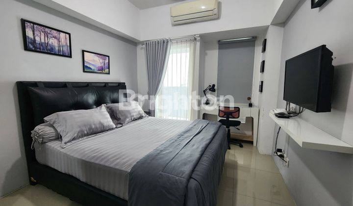 APARTEMEN TANGLIN TIPE STUDIO VIEW POOL AND CITY  1