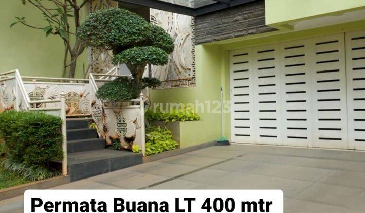 Lepas Cepat Rumah Minimalis Permata Buana hadap timur, Taman luas 1