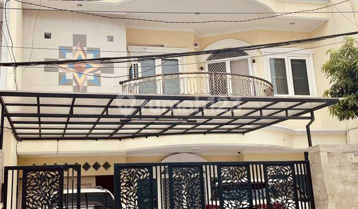 DIJUAL RUMAH CANTIK HADAP TIMUR LAUT LOKASI TERBAIK DI TAMAN SURYA 