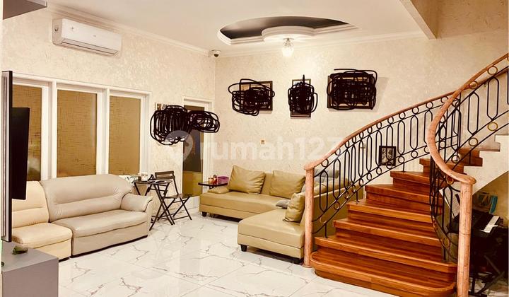 DIJUAL RUMAH CANTIK HADAP TIMUR LAUT LOKASI TERBAIK DI TAMAN SURYA  2