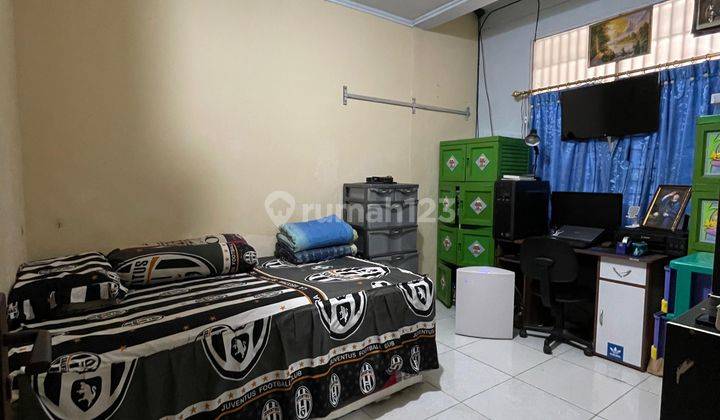 RUMAH BESAR JALAN LEBAR HADAP SELATAN HARGA TERMURAH DI PURI GARDENA 2