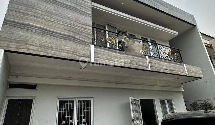 Rumah Minimalis Full Marmer Hadap Utara Harga Murah Di Taman Grisenda 1