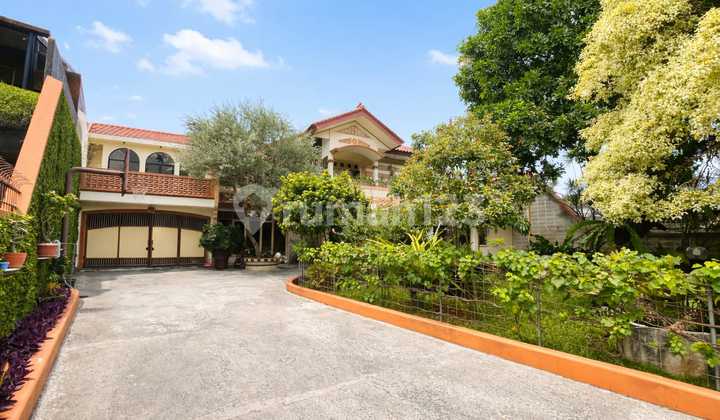 Jual Cepat Rumah Luas Hoek dan Asri Pinggir Jalan Dekat Perumahan Taman Mutiara Prima dan Tosiga