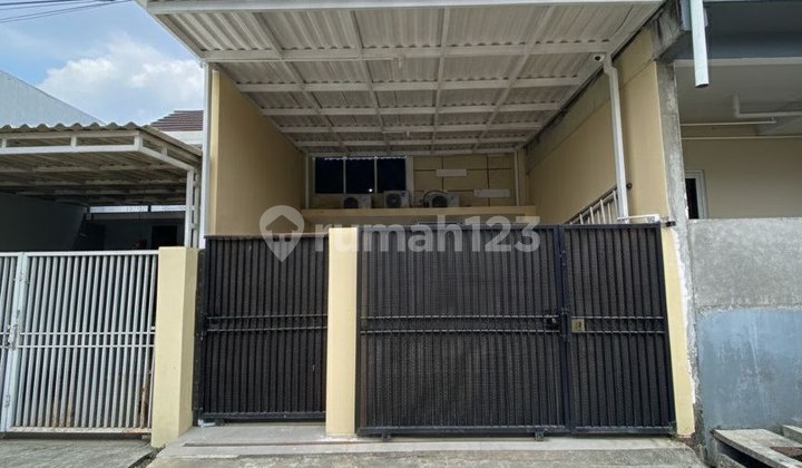 Medayu Utara Rungkut House with Carport Ready to Occupy 1