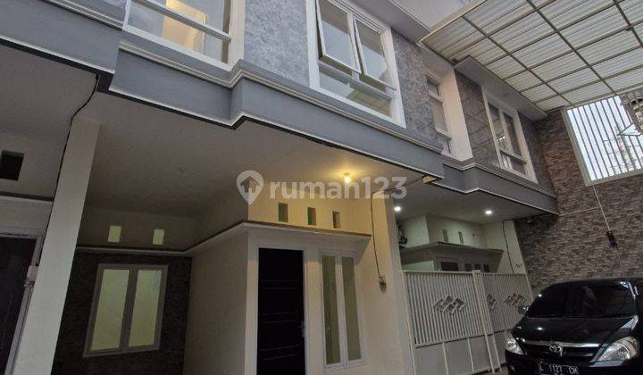 Rumah New Minimalis 2 Lantai Strategis, Bebas Banjir 1