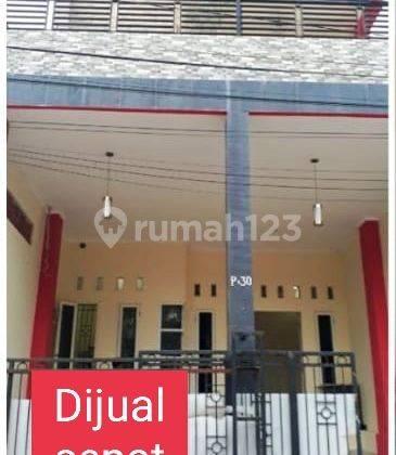 Dijual cepat rumah minimalis 2 lantai di graha taman Kebayoran bekasi  1