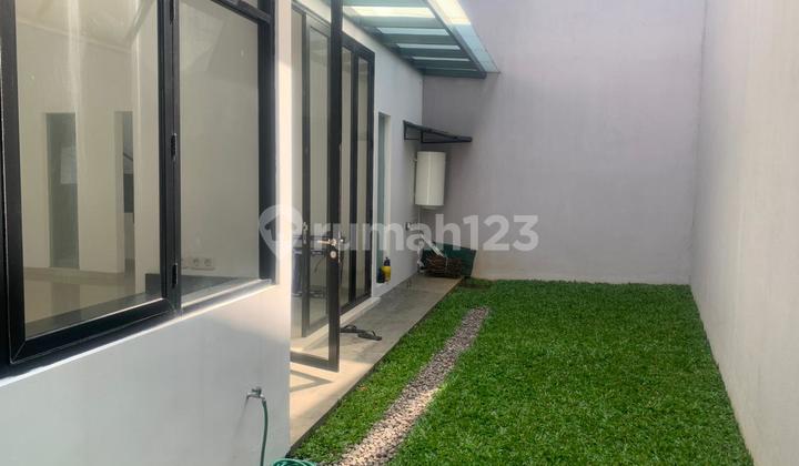 LUXURIOUS NEW 2-STORY HOUSE IN A COMFORTABLE AND STRATEGIC NEIGHBORHOOD, READY TO OCCUPY IN CIPAGANTI, BANDUNG