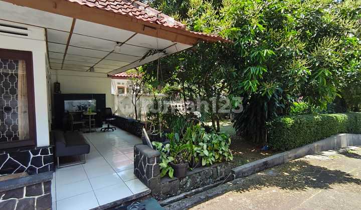 A comfortable, well-maintained one-story house in the strategic city center, ready to occupy on Surapati Main Road, Bandung.