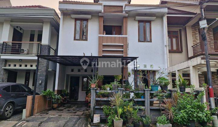 Rumah depan taman dalam cluster di buaran jakarta timur 1