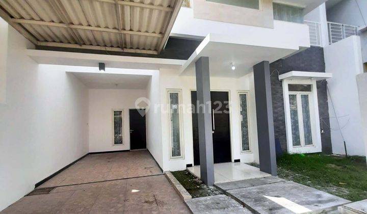 Rumah di Taman Rivera Regency Rungkut Surabaya Timur, 2 Lantai, Minimalis, Bagus + Terawat, Siap Huni !! 2