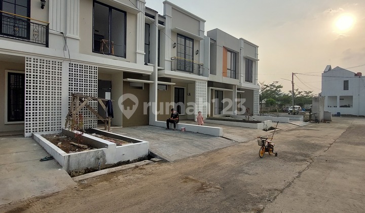 Rumah STRATEGIS MAINROAD 2lantai dapat  10jt all in di PATARUMAN


 4