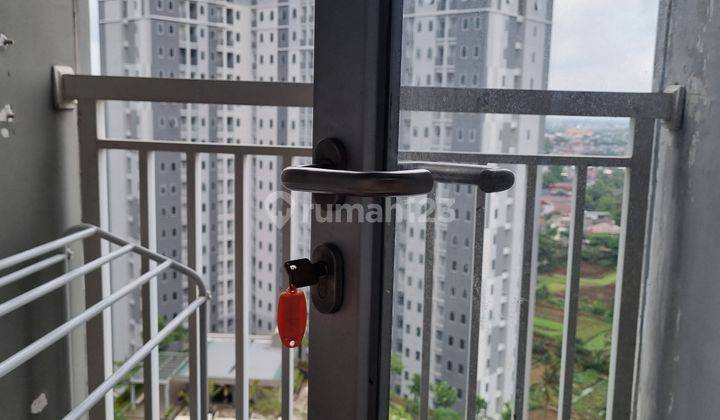 Apartemen 2 Kamar Tidur Semi Furnished Bagus 1