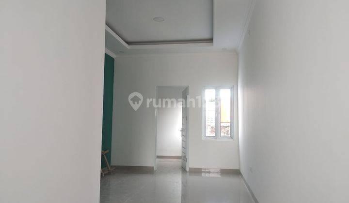 Rumah 2 lantai free biaya surat2 strategis siap huni 9
