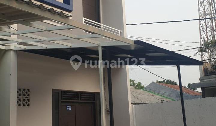 Affordable 2-Story House Near Green Lake City, West Jakarta