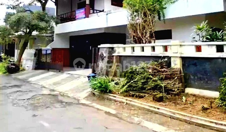 i093  Rumah Hook dan Strategis dekat SMK Telkom Sawojajar Malang 