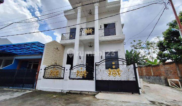 Dijual Murah Rumah 2,5 lantai BARU MEWAH diatas perumahan 50 meter an ke jalan Raya Kodau Jati Mekar Jatiwarna Bekasi Selatan 1