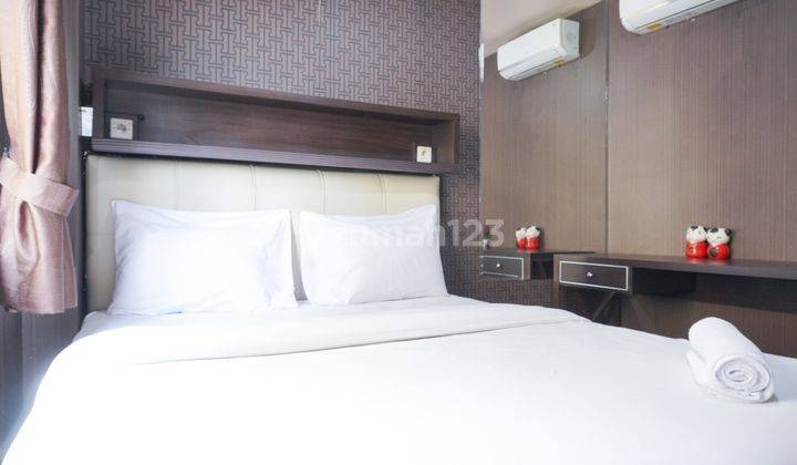 1BR Furnished Apartemen Palm Mansion 2