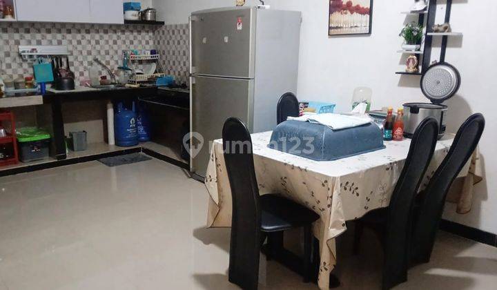 Cozy Living 4BR House at Graha Garden Sawangan By Travelio Realty 5