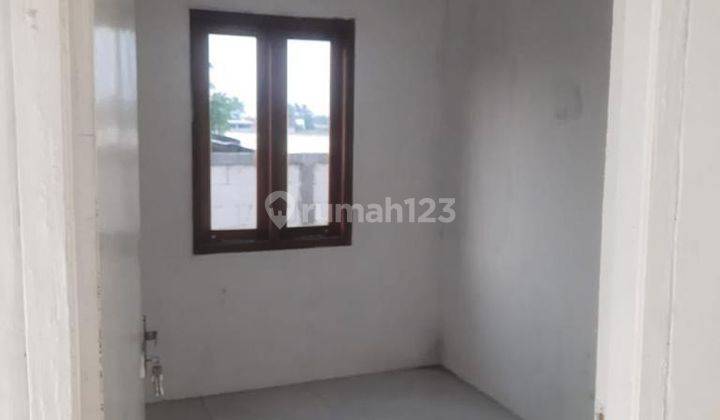 Cozy Stay 2BR House at Perumahan Taman Mulya Angkasa By Travelio Realty 10