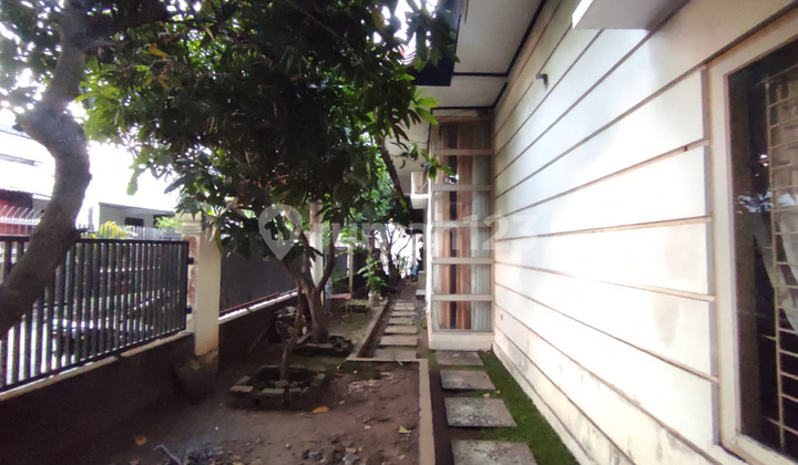 Spacious 4BR House at Kompleks IDI By Travelio Realty 11