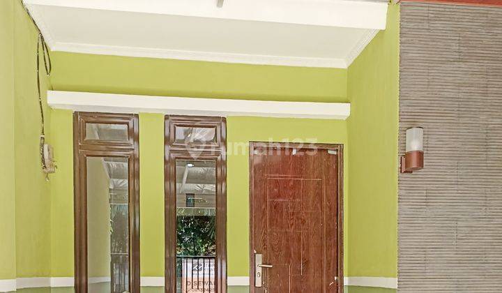 Comfortable 2BR House at Grand Taman Sari Residence 1 By Travelio Realty 4