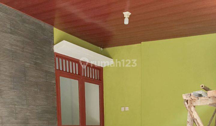 Comfortable 2BR House at Grand Taman Sari Residence 1 By Travelio Realty 5