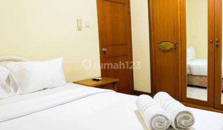 2BR Fully Furnished at Red Top Apartment By Travelio 12