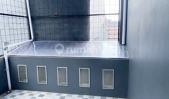 3br House At Jatimulya Small Living 2 By Travelio Realty 12