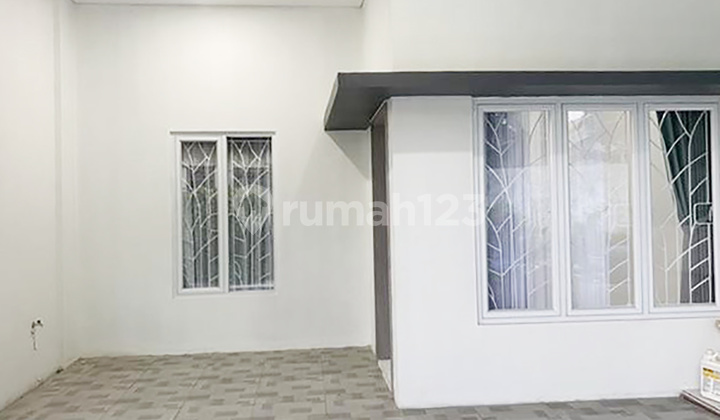 3br House At Jatimulya Small Living 2 By Travelio Realty 15