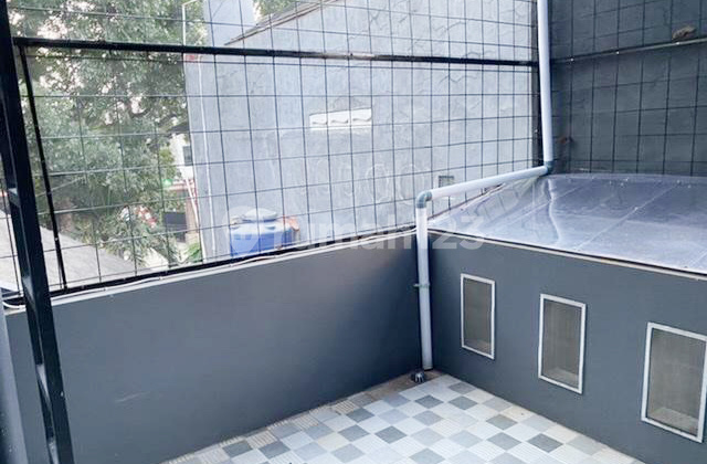 3br House At Jatimulya Small Living 2 By Travelio Realty 17