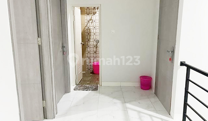 3br House At Jatimulya Small Living 2 By Travelio Realty 20