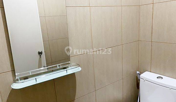 3br House At Jatimulya Small Living 2 By Travelio Realty 21