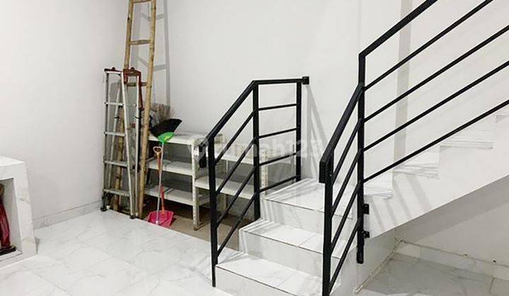 3br House At Jatimulya Small Living 2 By Travelio Realty 27