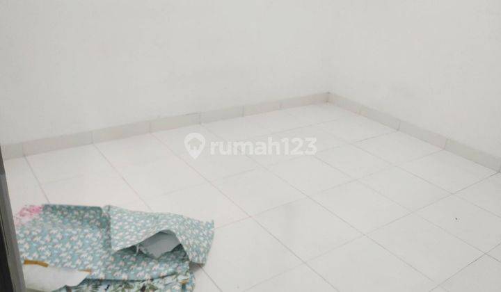 Unfurnished 2BR House at Puri Nirwana 15 Cikarang By Travelio Realty 13