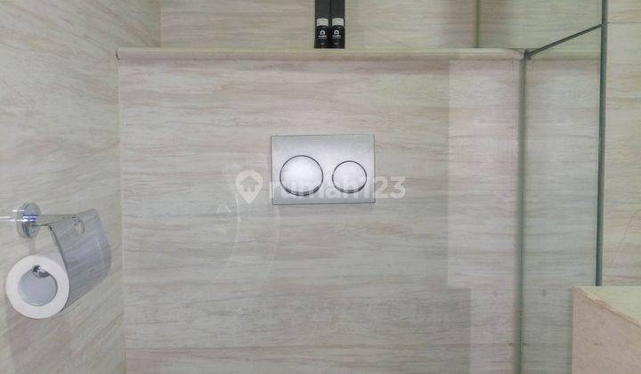 1br Furnished Apartemen Uttara The Icon By Travelio 24