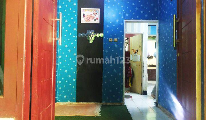 Unfurnished 2br House At Perumahan Mustika Grande By Travelio Realty 25