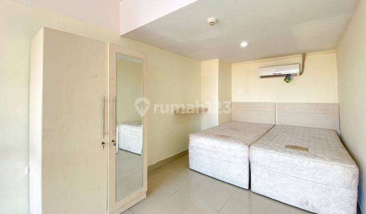 Studio Unfurnished With Ac At D loft Apartment By Travelio 21