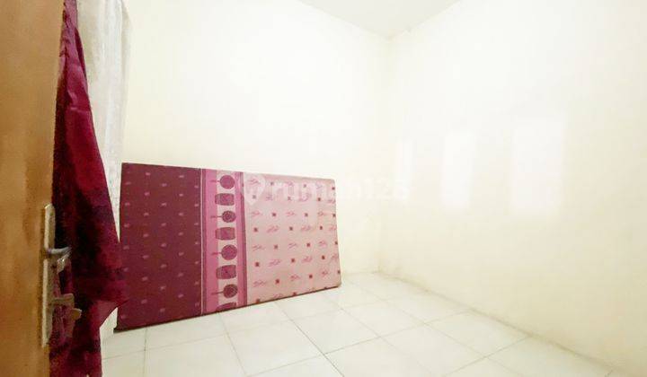 4br Unfurnished House At Pesona Cinangka Asri Sawangan By Travelio Realty 9